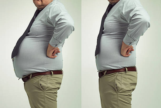 Before and after studio shot of a businessman's weight loss